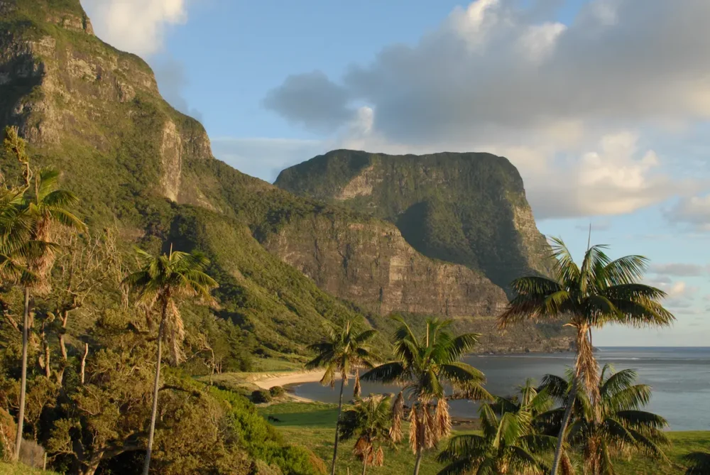 5 of the World’s Most Exclusive Islands Worth Visiting 2 A view of the lagoon and mountains on Lord Howe Island, Australia