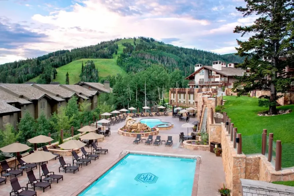 Pool and patio of a condo ski resort in the summer